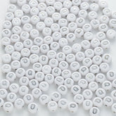 BD00100-02-silver-letter-white-opaque-coin-alphabet-beads-single-q-4×7mm